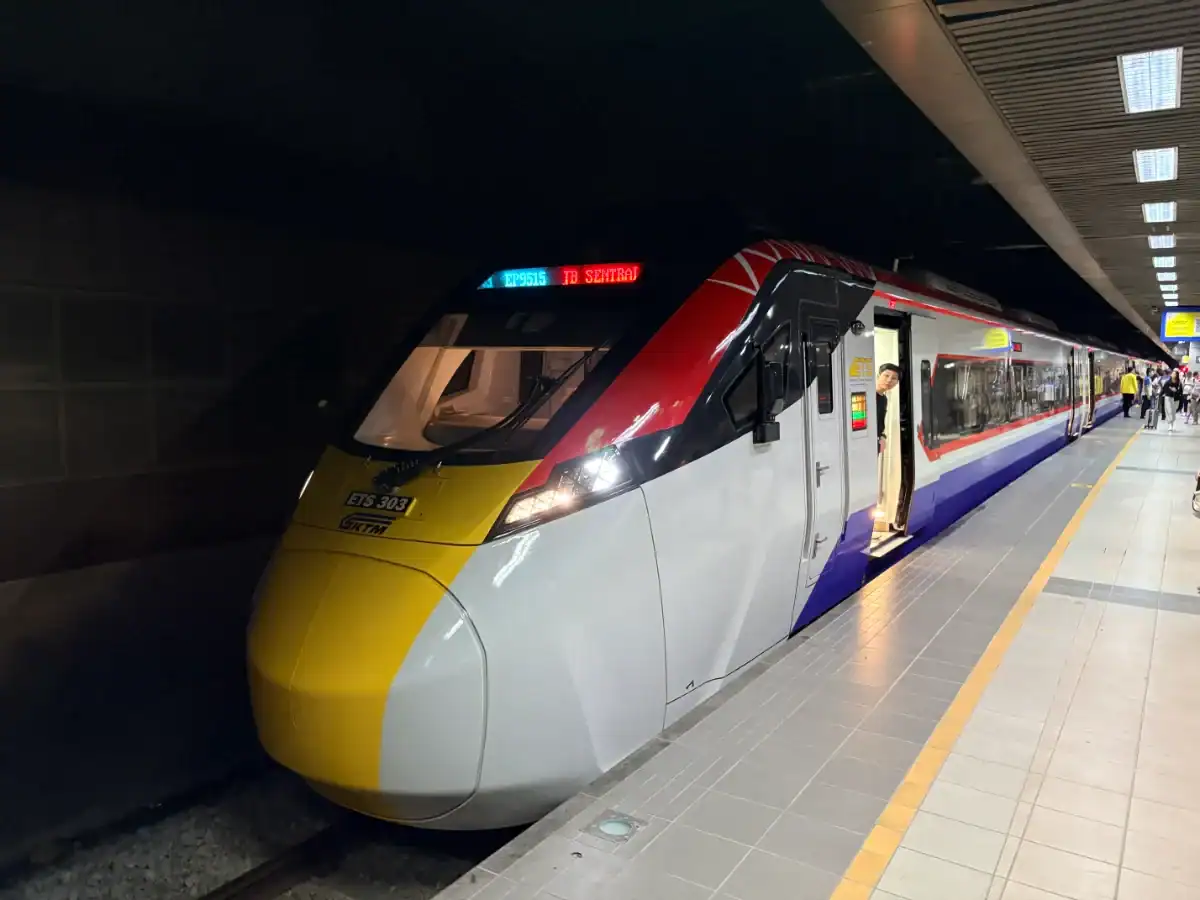 ETS train at a station, heading from KL to JB.